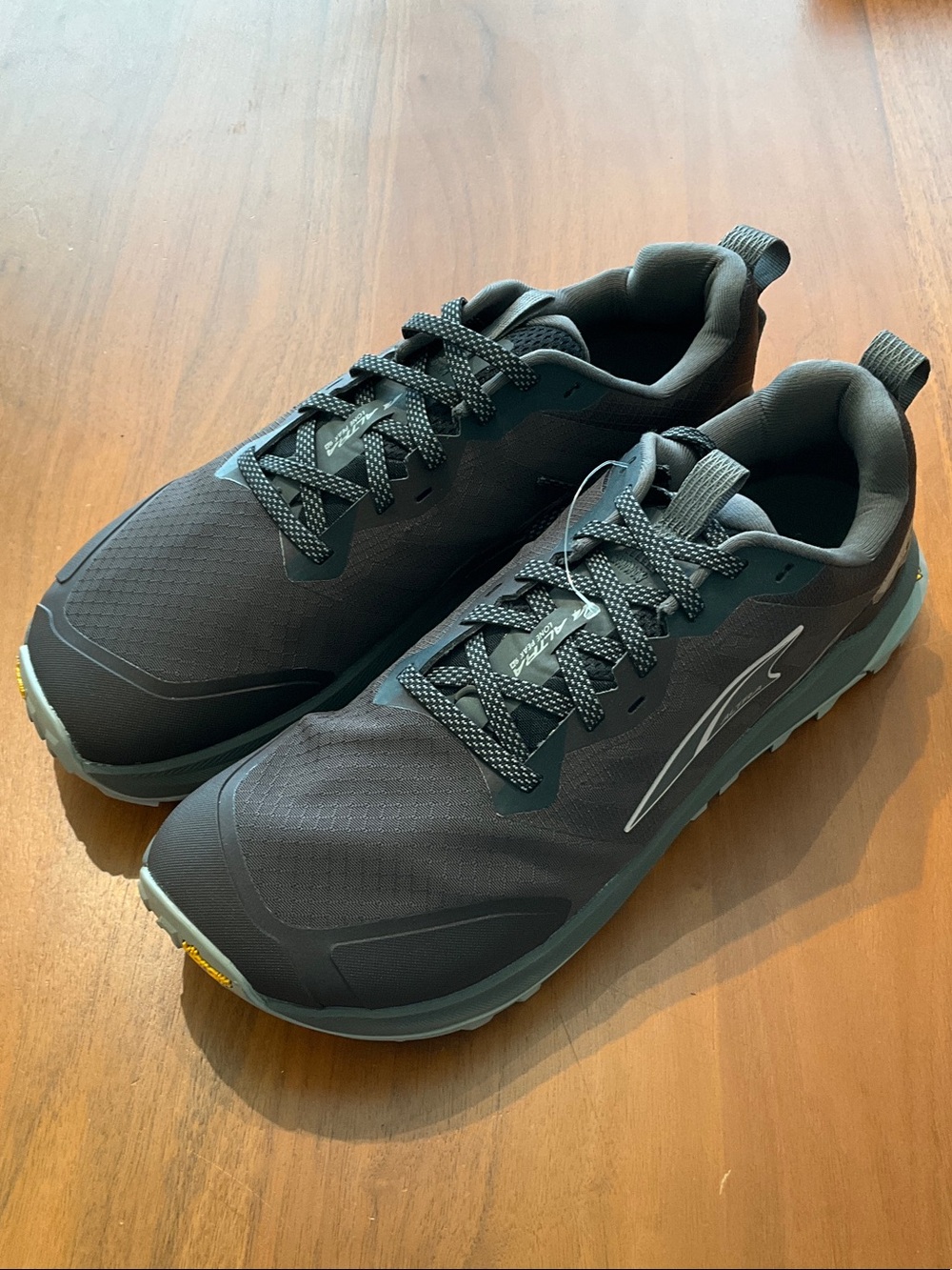 Lone Peak 9+ Altra Men’s Black and Teal Trail Running Shoes sample